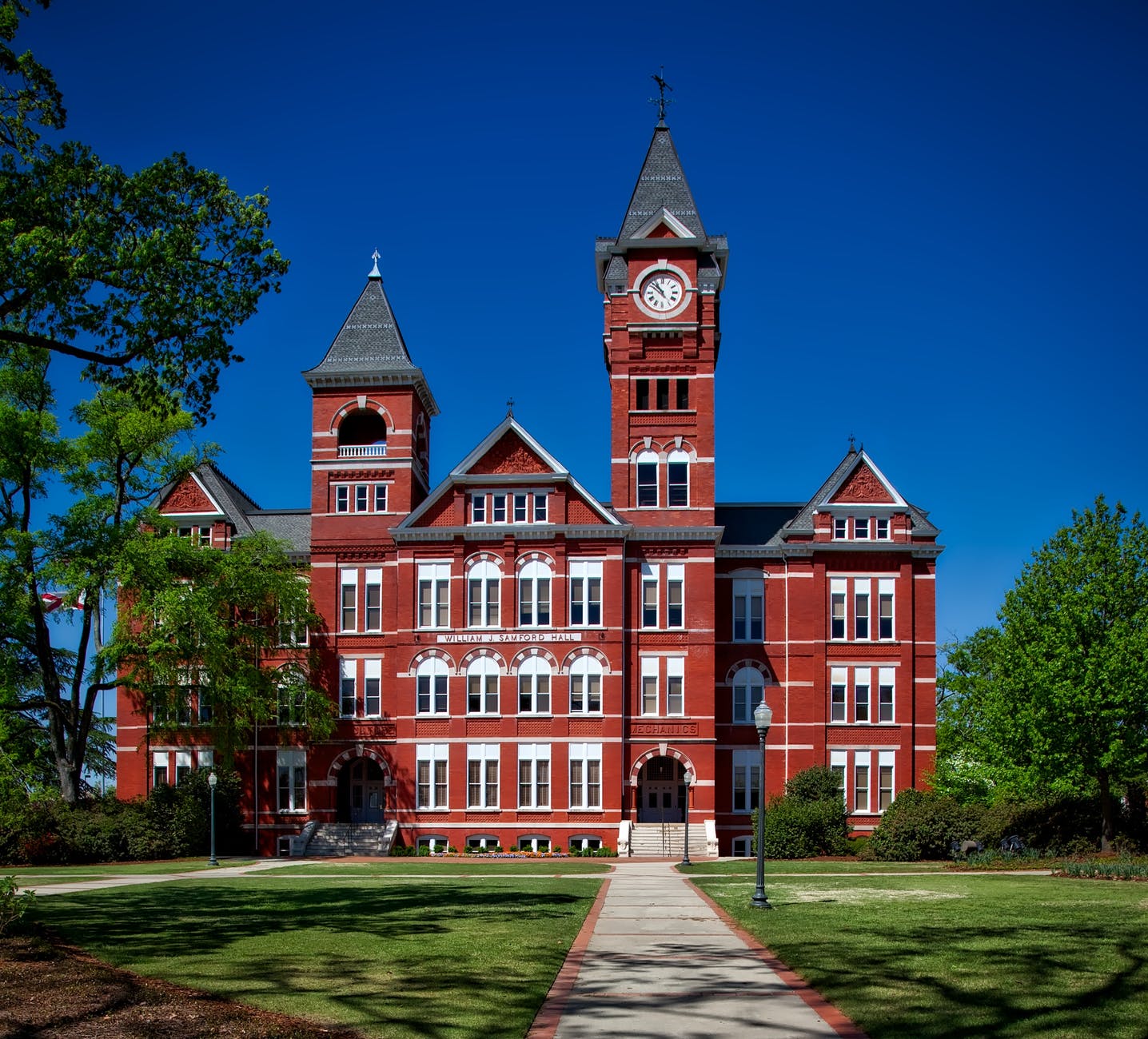 red building with clock tower